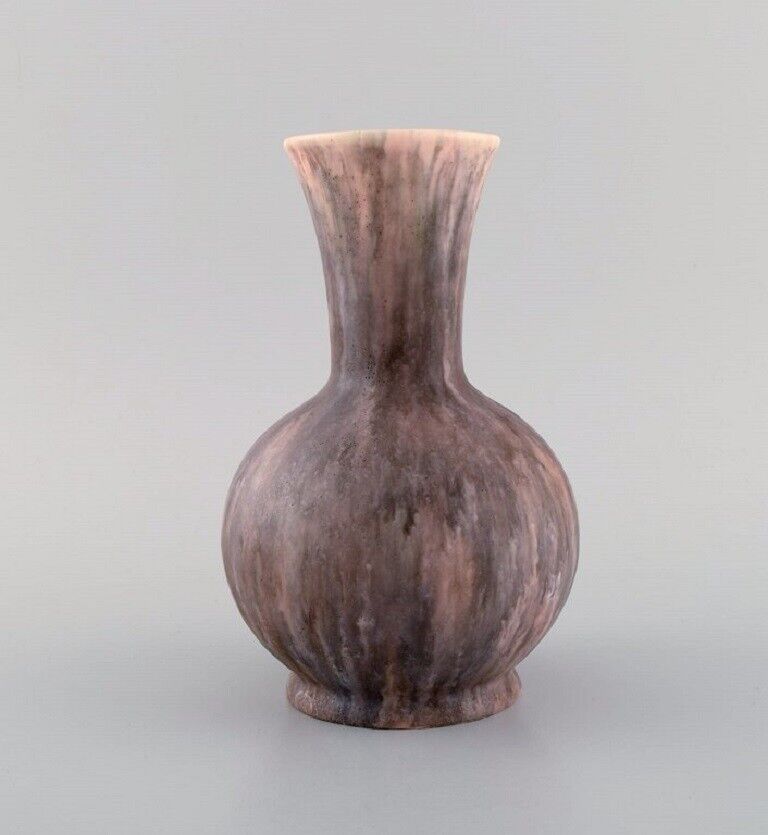 Antique Zsolnay vase in glazed ceramisc with pink undertones. App. 1910