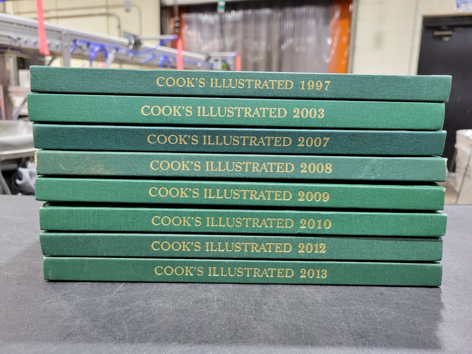 Lot of 8 Cook\'s Illustrated Annual Cookbooks 1997, 2003, 2007-2010 & 2012-2013
