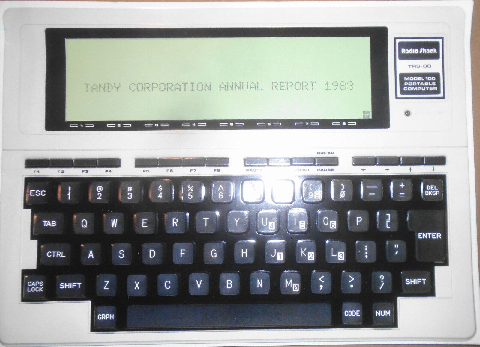 [Radio Shack] Tandy Corporation Annual Report 1983 with embossed Model 100 cover