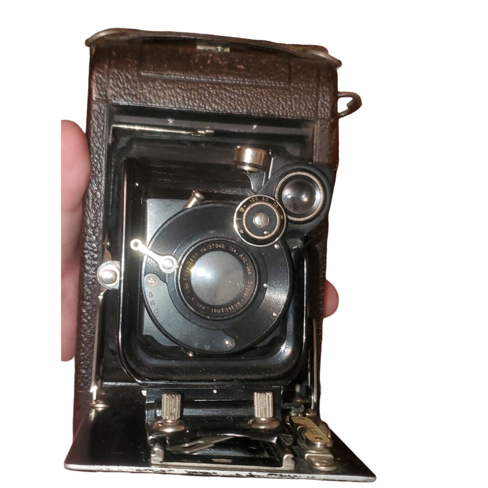 Vintage folding camera from the early 1900s Doppel Anistigmat lens and film