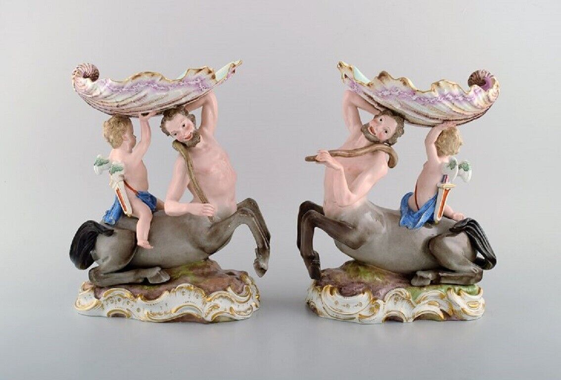 A pair of antique figurative Meissen compotes in hand-painted porcelain.