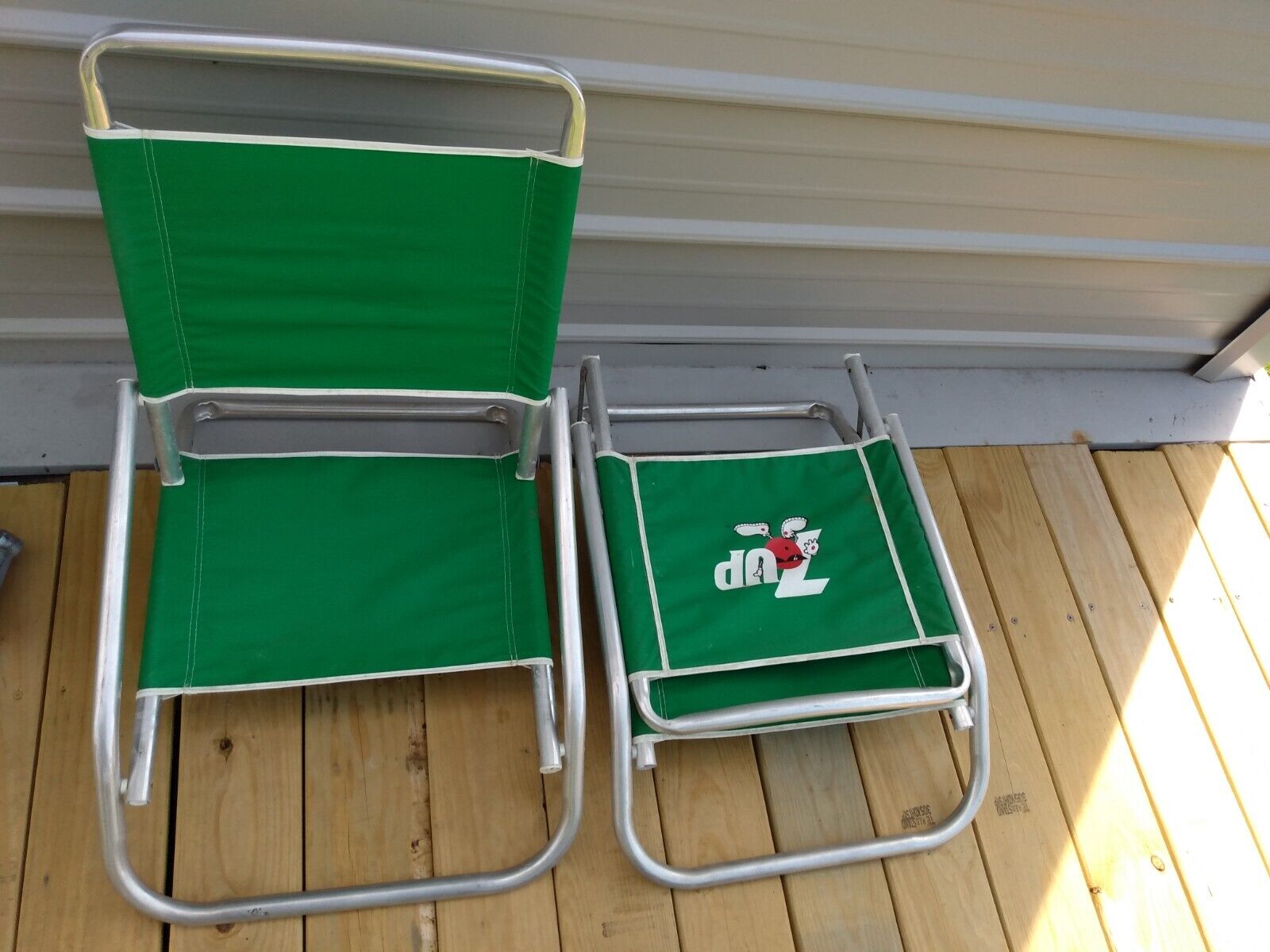 vintage folding beach stadium chairs 7up logo aluminum frame soda pop pair