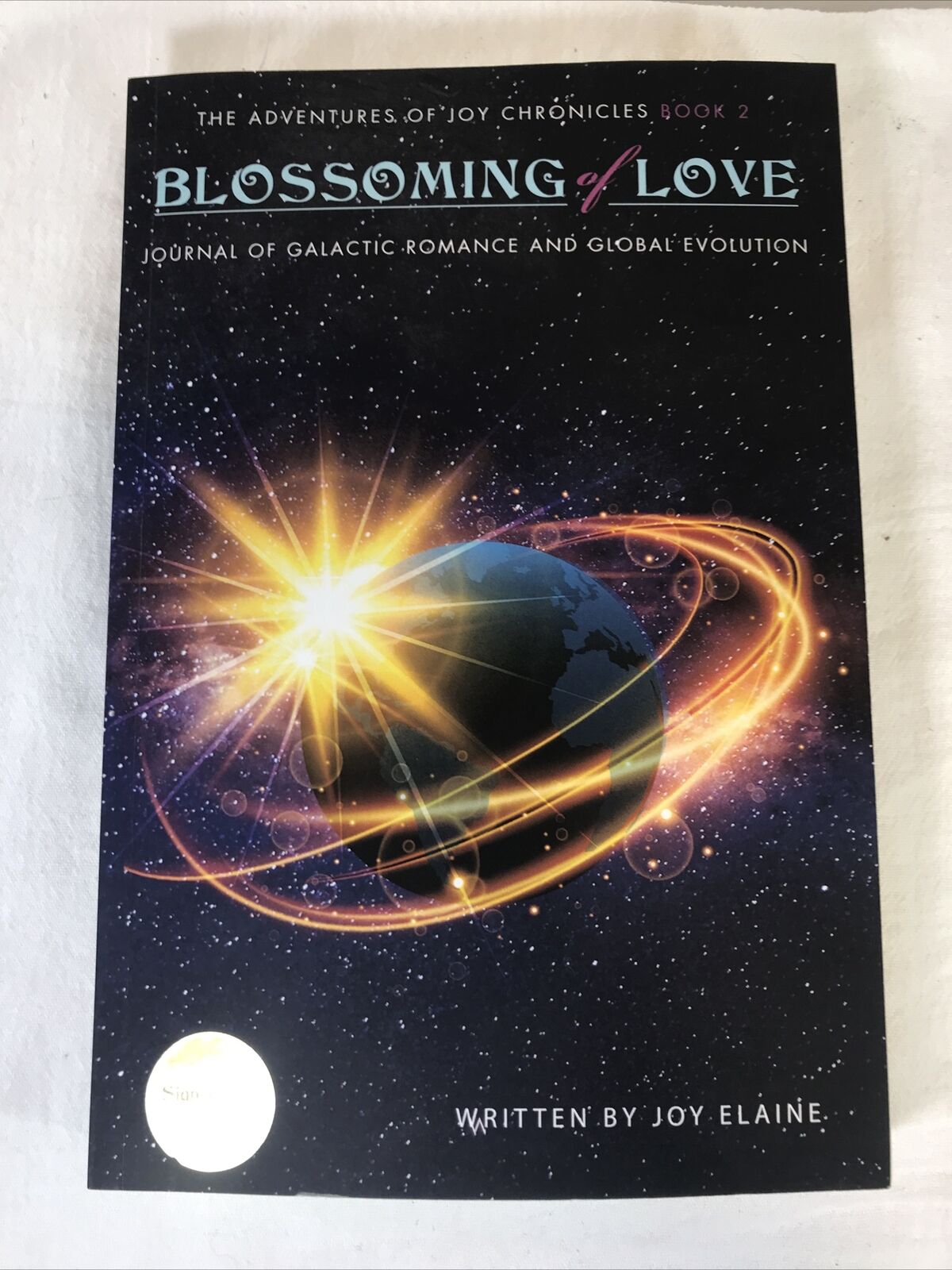 Signed THE BLOSSOMING OF LOVE (THE ADVENTURES OF JOY CHRONICLES) By Joy Elaine