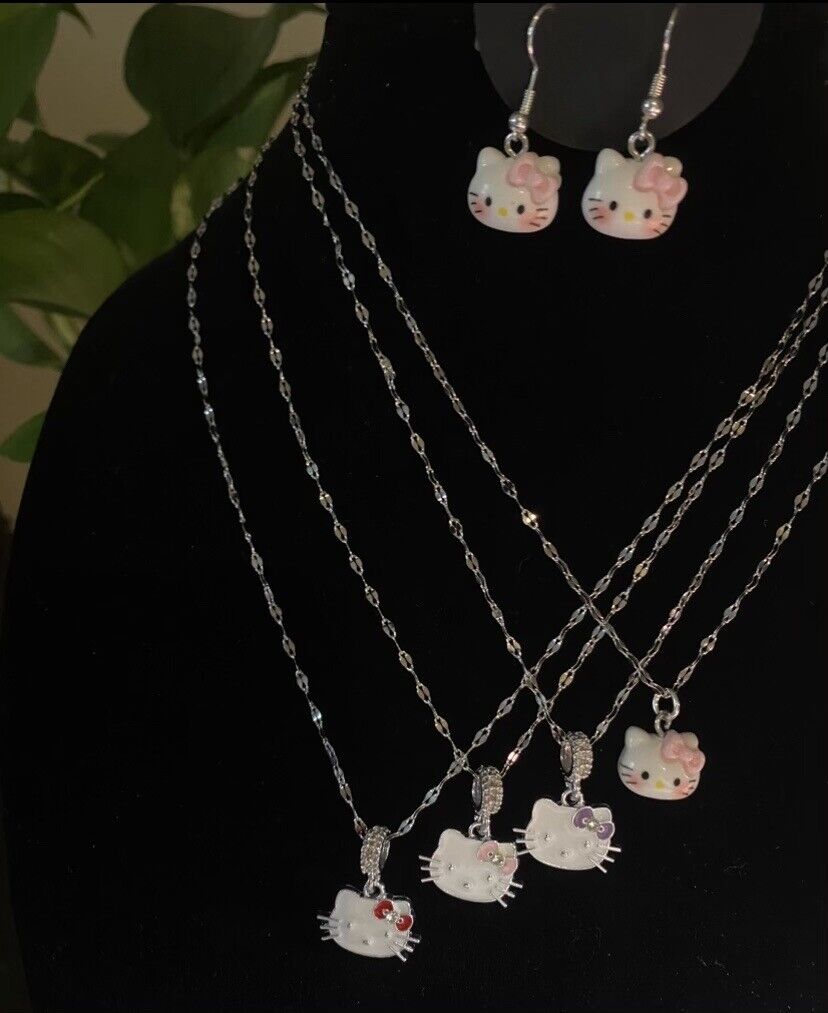 hello kitty jewelry lot 4 Necklaces And One Pair Of Earrings