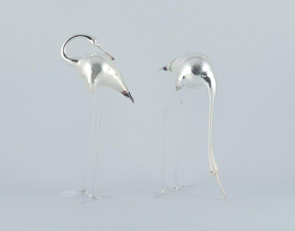 Murano, Italy. Two rare art glass sculptures with silver decoration. The cranes.