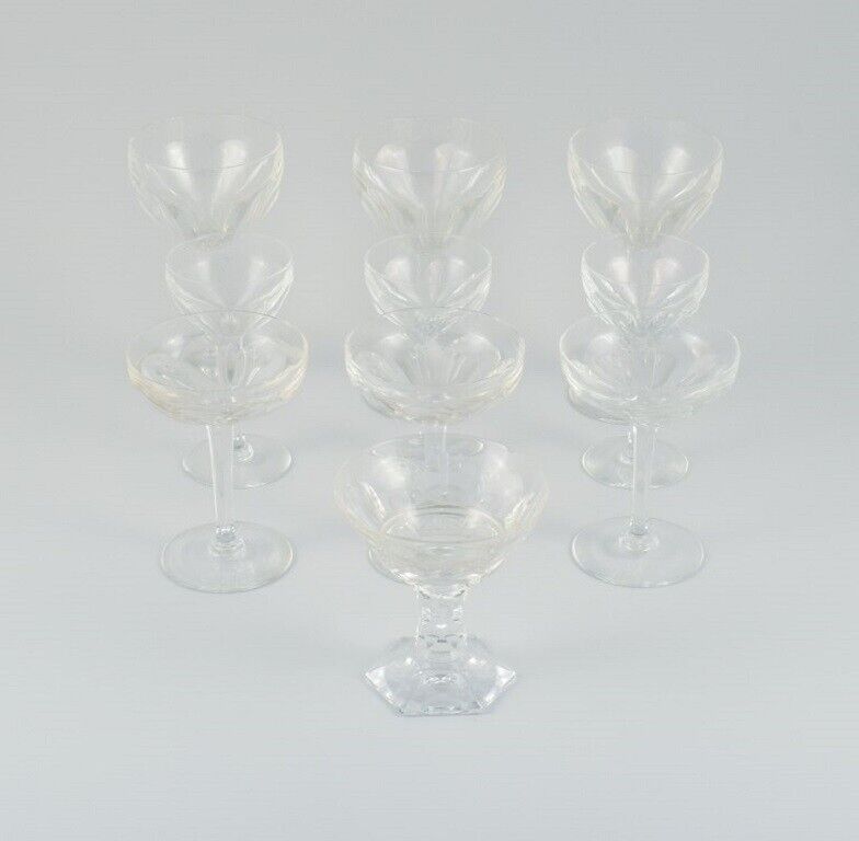 Baccarat, France, ten Art Deco crystal glasses in clear glass.