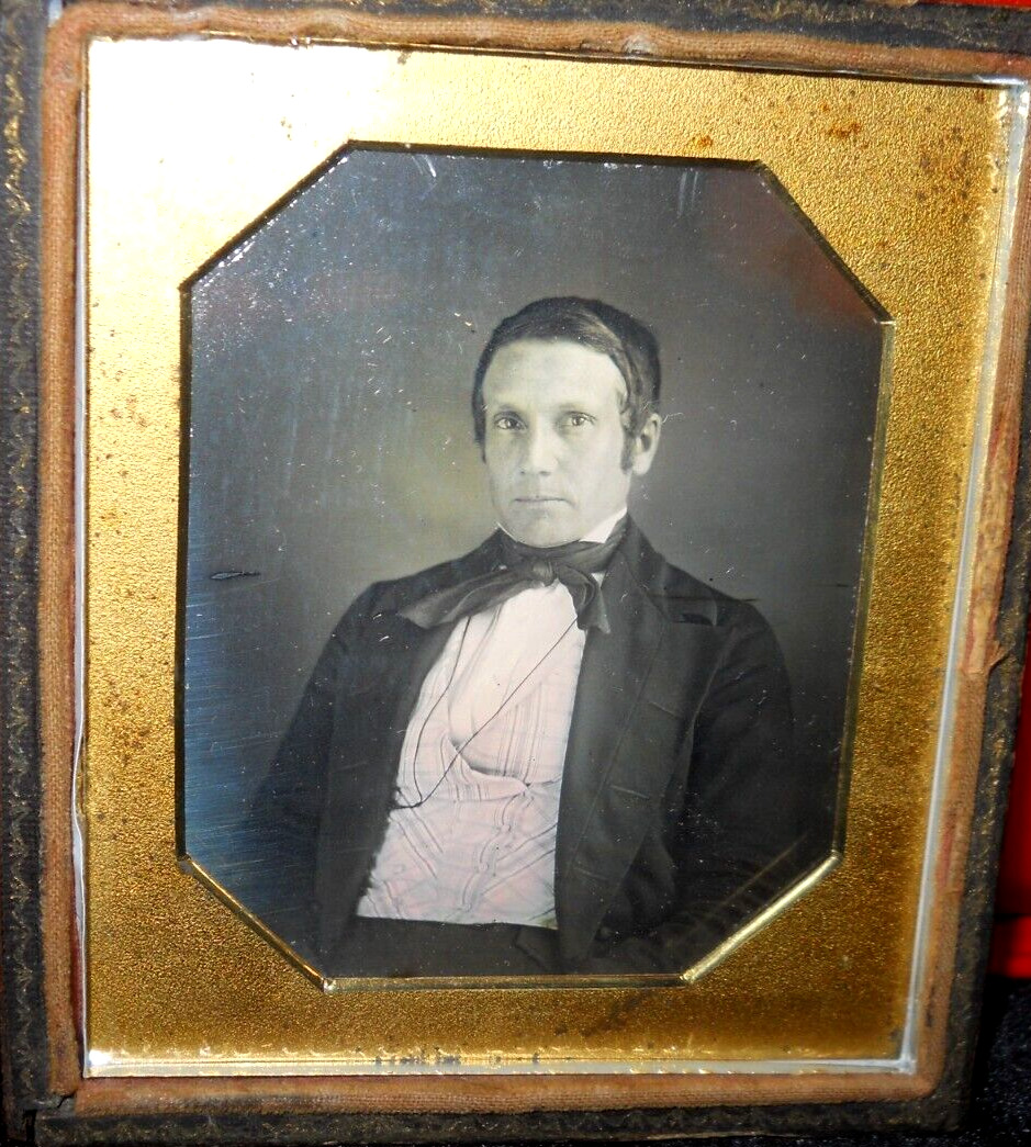 1/6th Size Daguerreotype of younger man in a half case