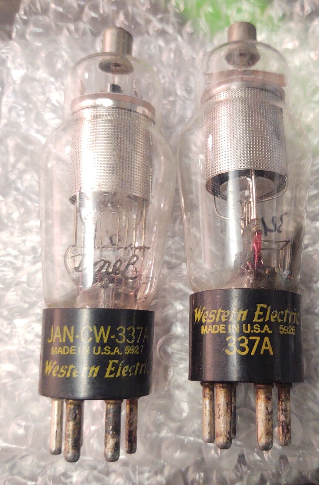 A matching pair Western Electric 337A tube - small punch 310A