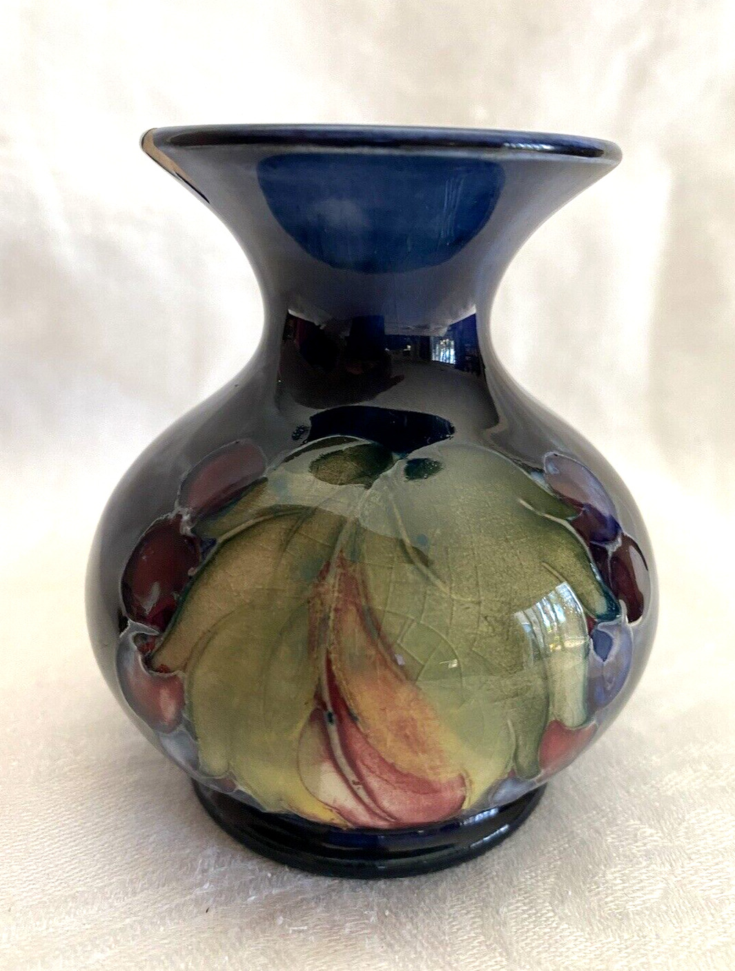 William Moorcroft Pottery Blue Leaf and Berry Vase Chip on Rim from 1920s or 30s
