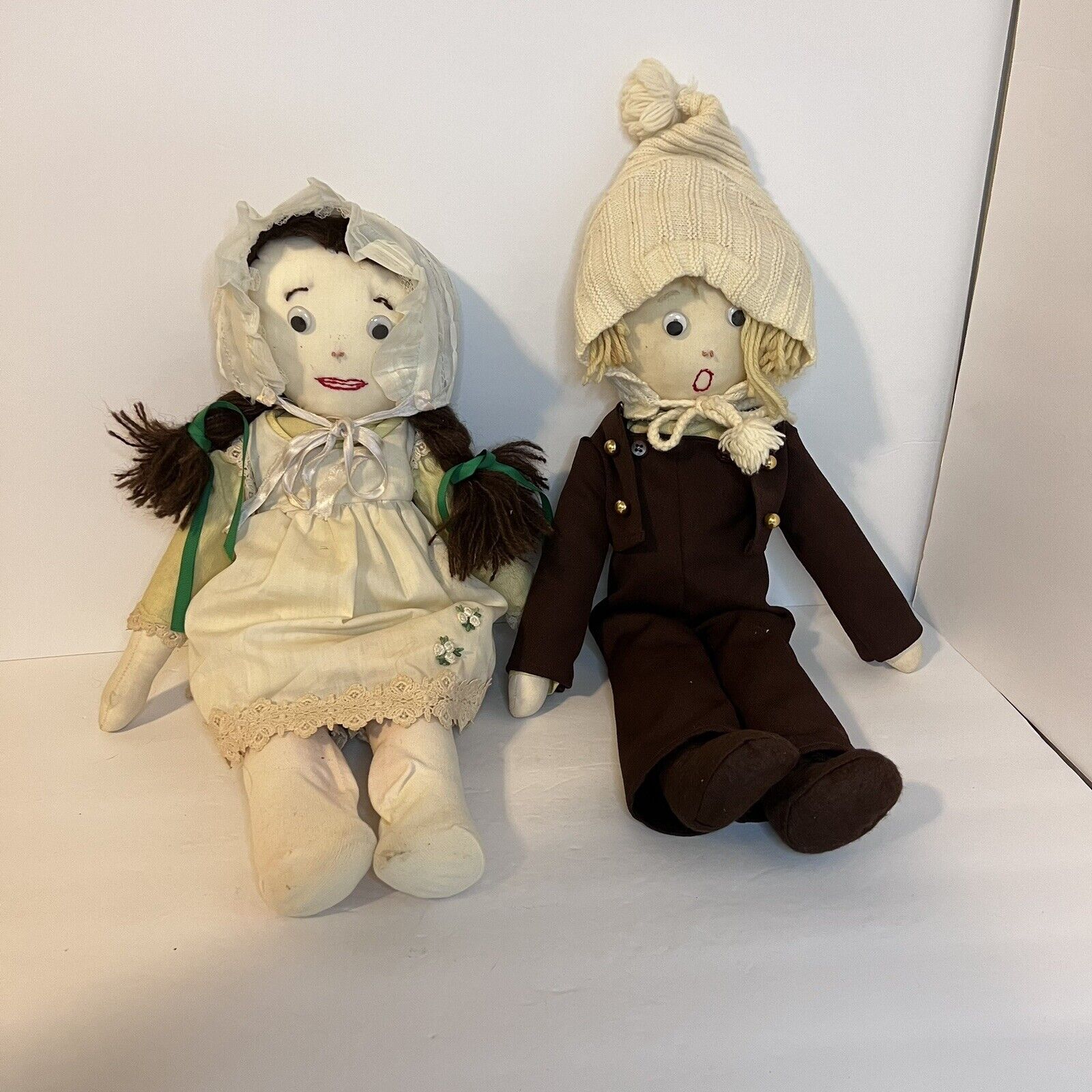 Two Antique Handmade Embroidered Face Cloth Dolls Pigtails, Overalls, Googly Eye