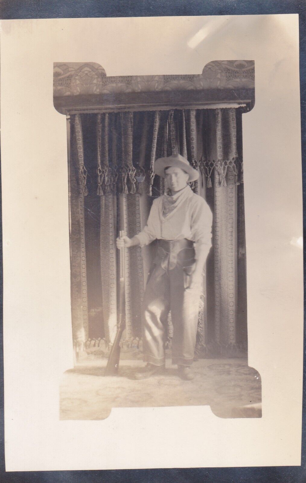 RPPC Real Photo Postcard of Cowboy Holding Rifle Wearing Leather Chaps