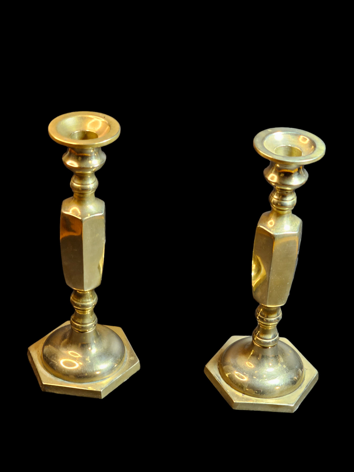 Title: 1960s/70s Brass Candlestick Pair: A Blend of Geometry and Craftsmanship