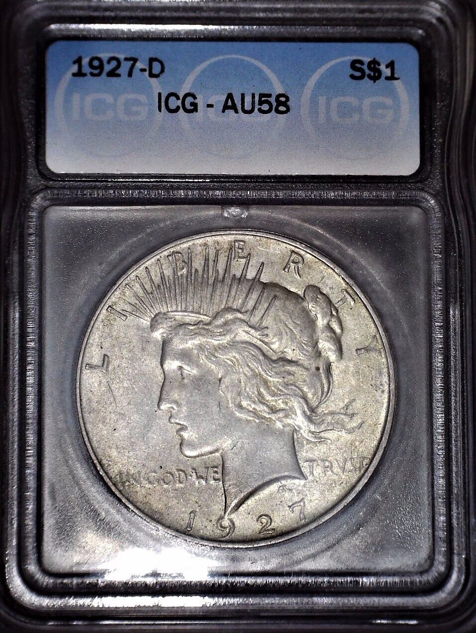 1927-D Peace Silver Dollar, ICG AU58. Original Patina  and Issue Free 