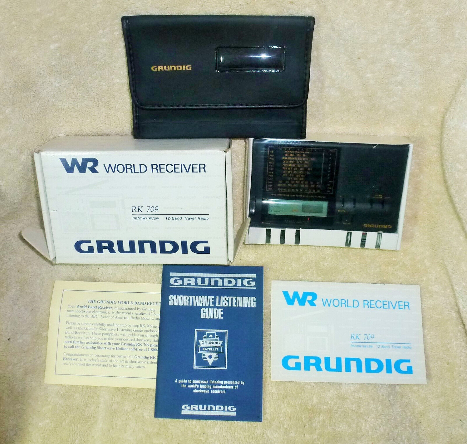 Sealed GRUNDIG World Receiver 12 Band Shortwave Radio RK709 With Listening Guide