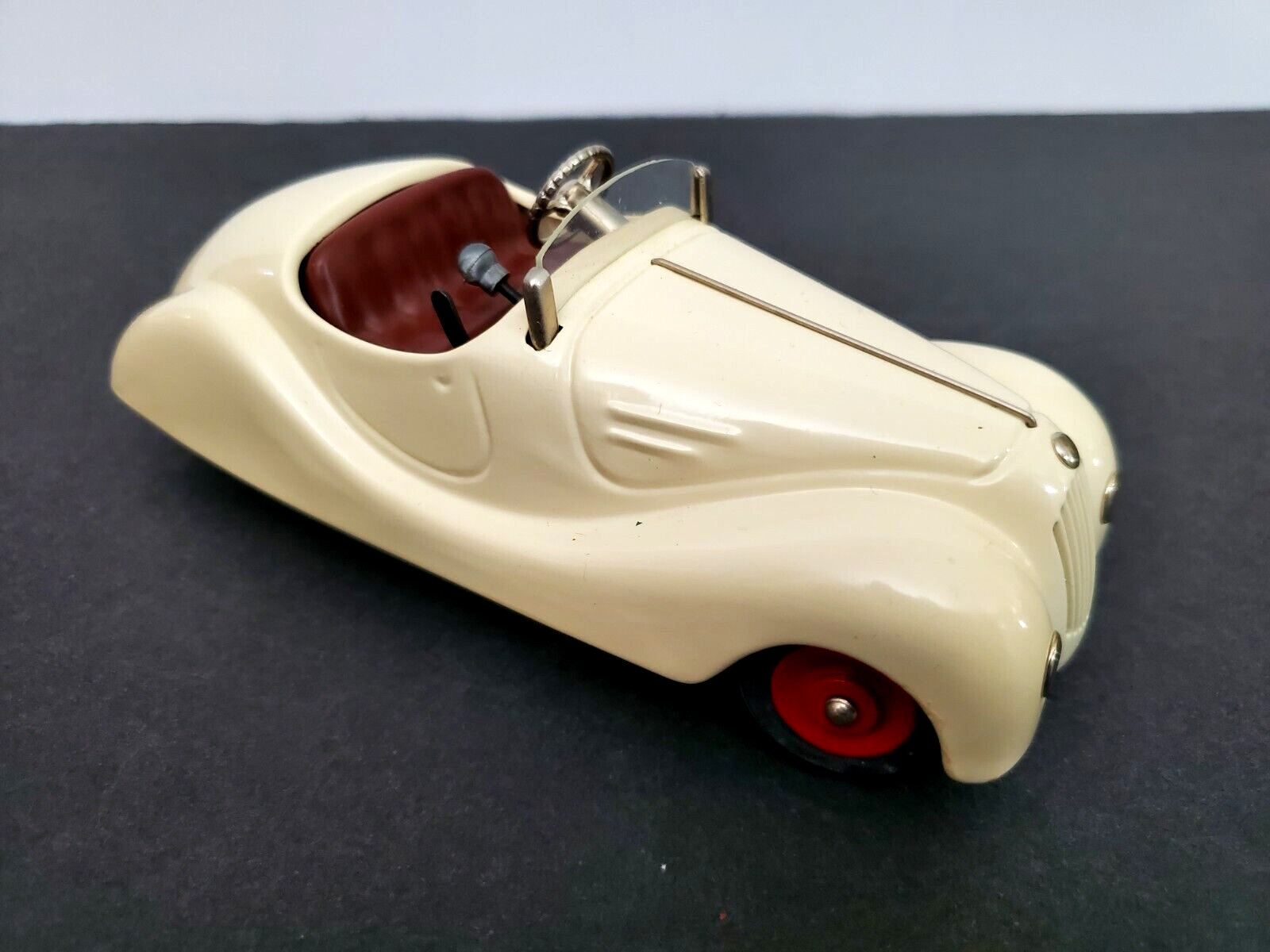 Vintage Schuco Examico 4001 wind-up toy white roadster from West Germany