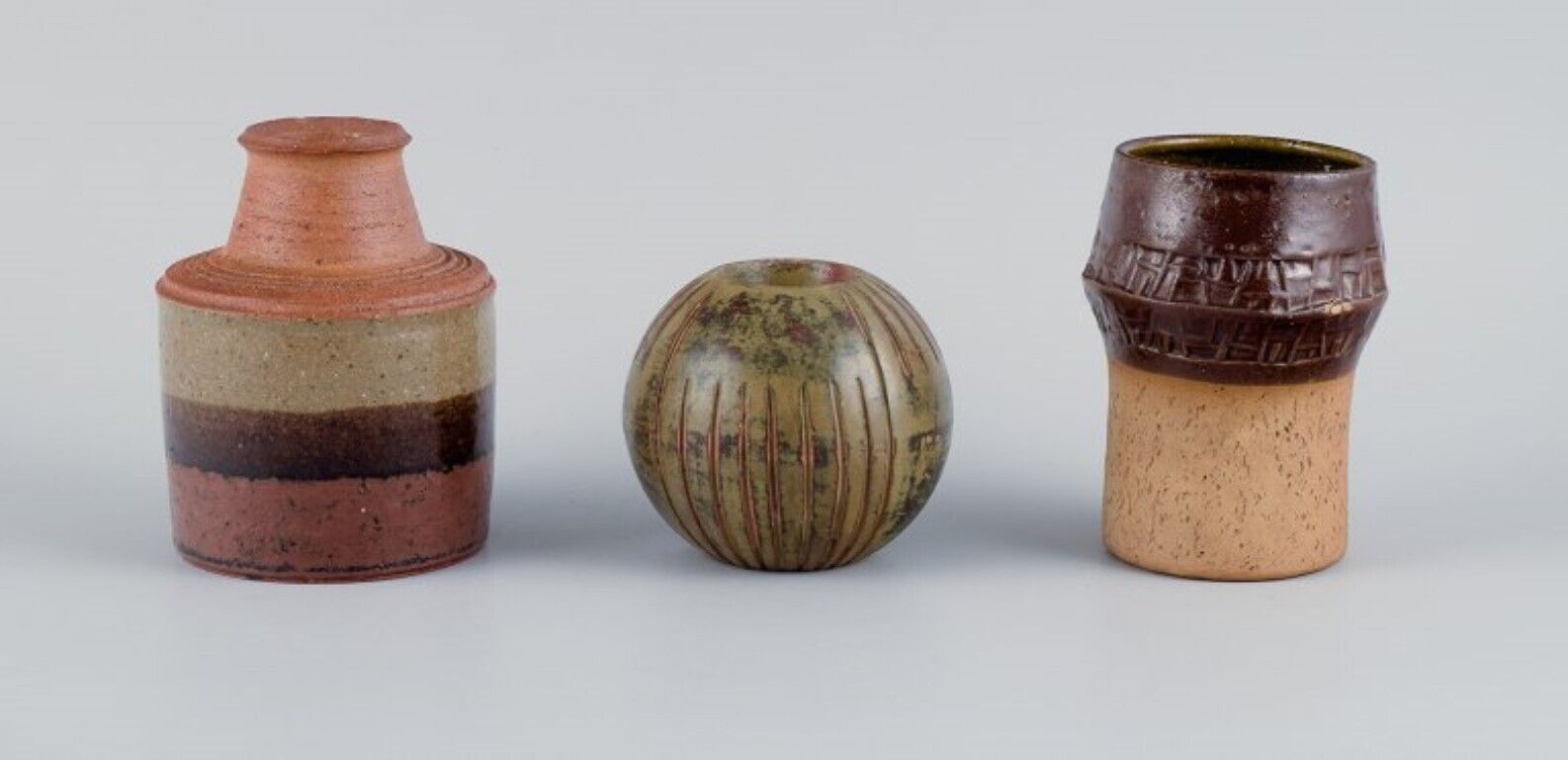 Conny Walther and others,  two ceramic vases and a candle holder for tealights
