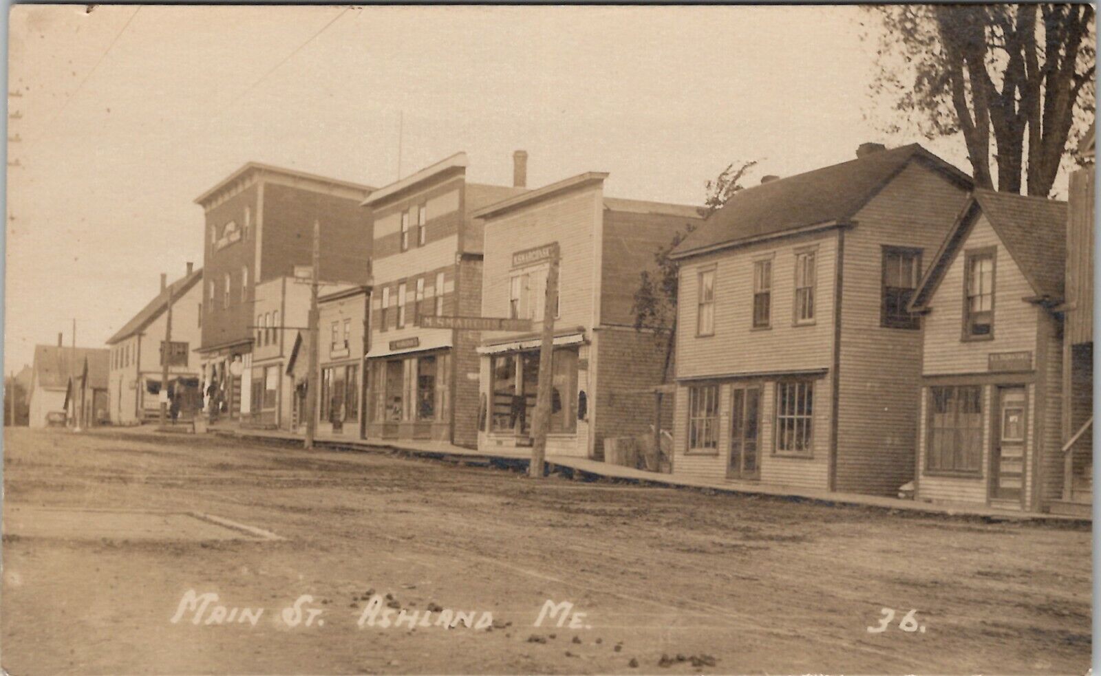 Ashland Maine RPPC View on Main Street Old Shops Businesses c1910 Postcard V20