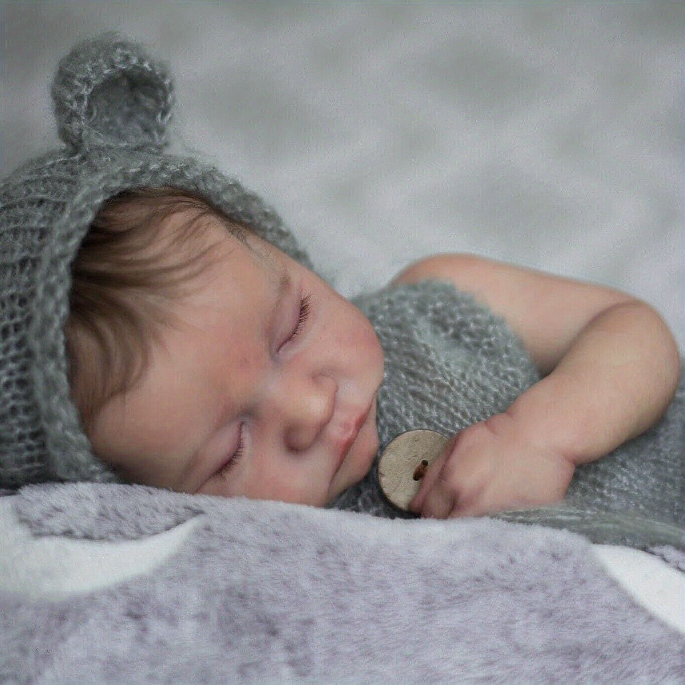 Lifelike Reborn Baby Boy Doll with Real-Touch Skin and Detailed Handcrafting