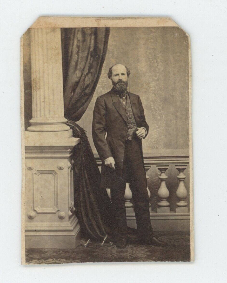Antique Trimmed CDV Circa 1870s Handsome Man With Full Beard In Long Coat Suit