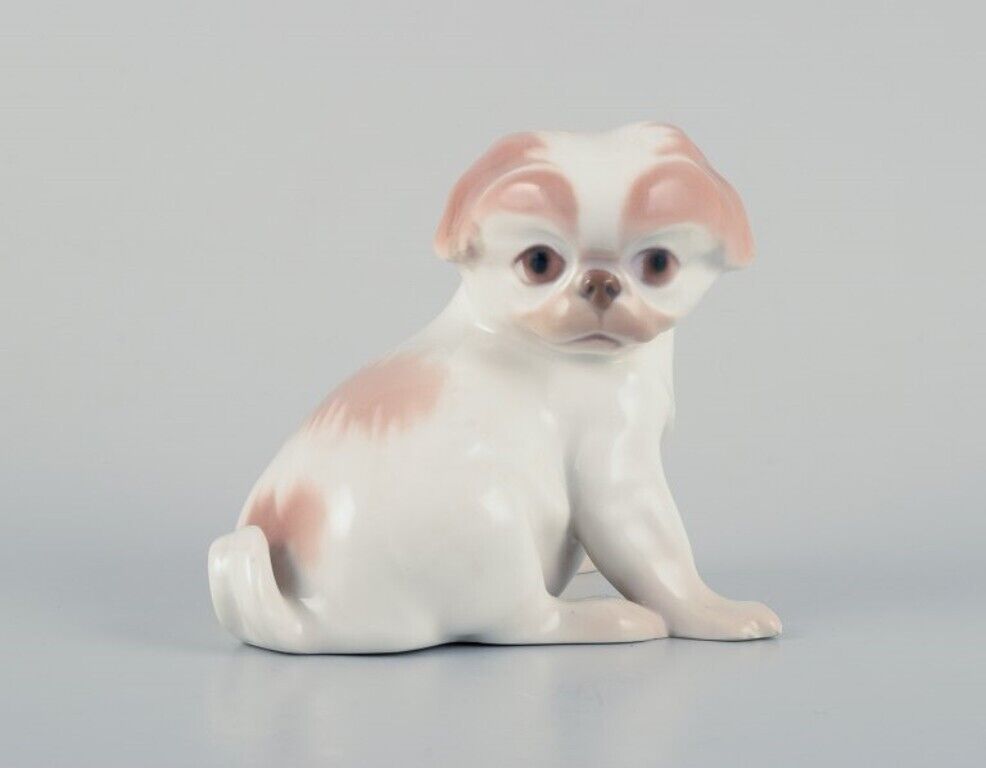 Dahl Jensen for Bing & Grøndahl, porcelain figurine of a Pekingese puppy.