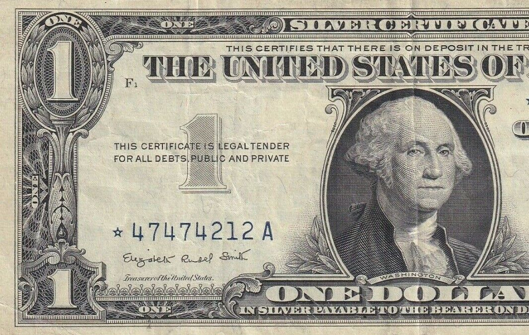 *4747212A 1957A SILVER CERTIFICATE, BLUE SEAL ONE DOLLAR STAR NOTE IN GOOD COND.