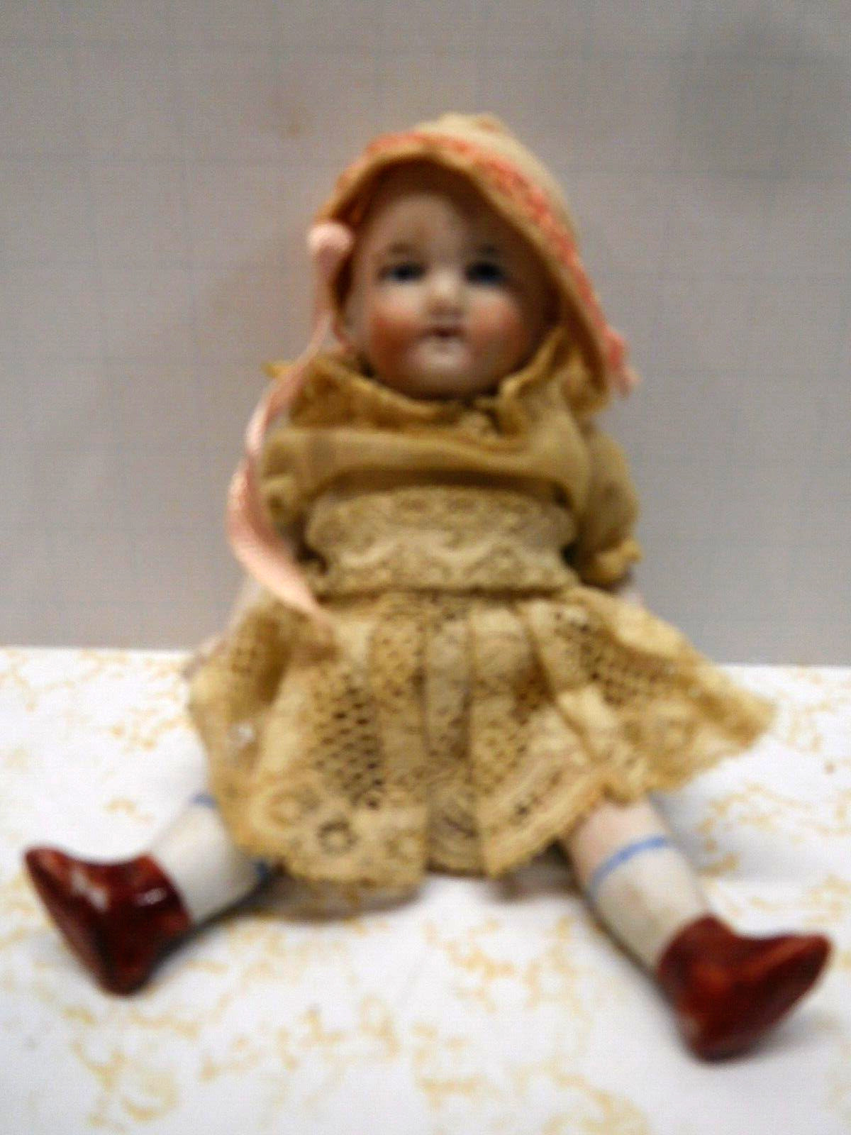 Antique Full Porcelain 4-1/2 inch Doll in Dress & Hat