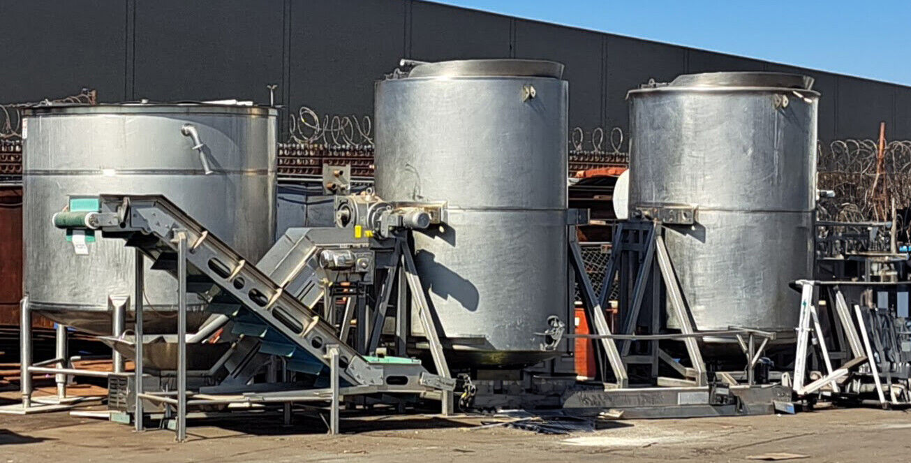 Two 1500 gallon tilting steam jacketed cookers and 1500 gallon cooling tank
