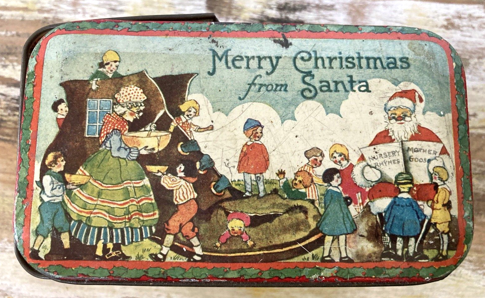 Antique vintage litho candy tin box Merry Christmas from Santa Tindeco 1920s