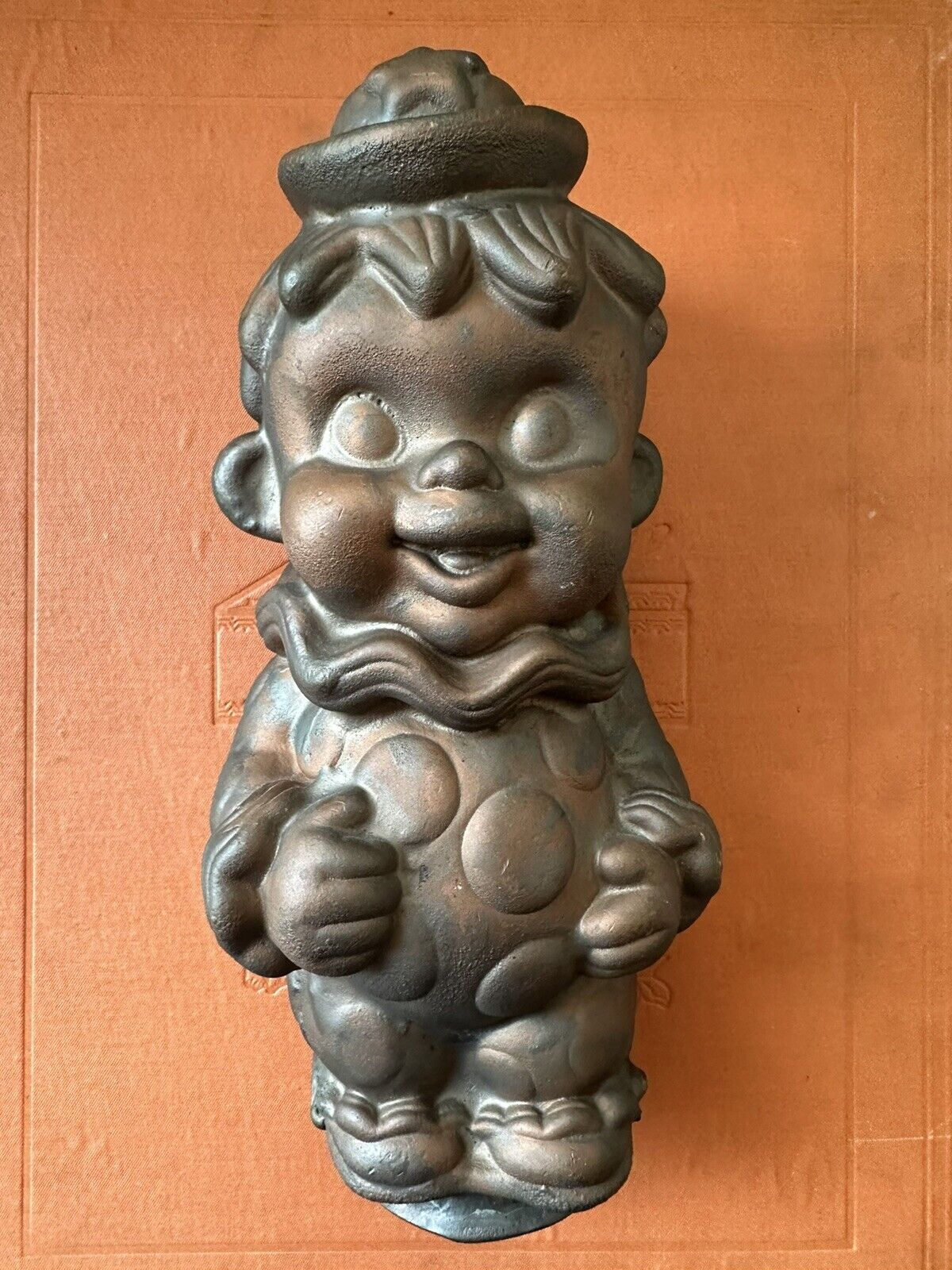 Vintage clown rubber squeak toy copper industrial factory mold