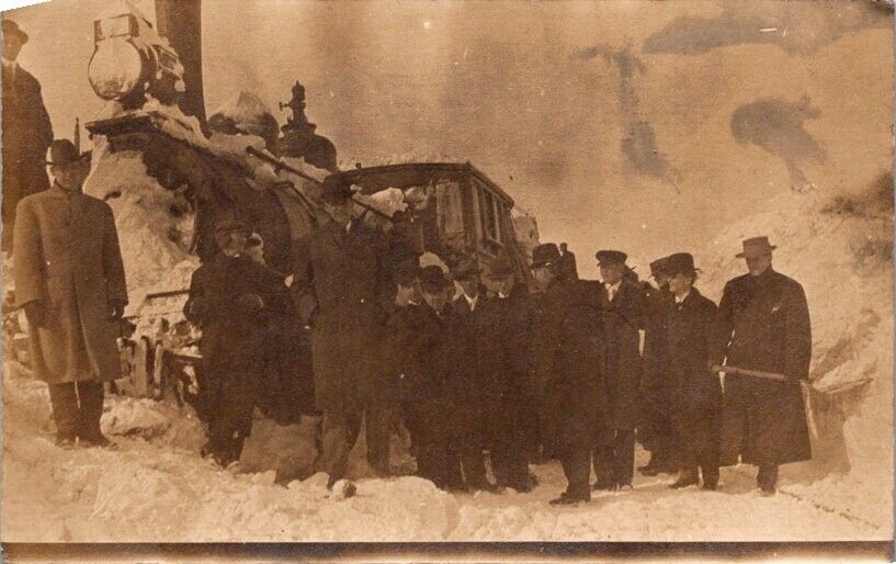 RPPC Postcard Man in Suits Stand for Photo by Snow Covered Train Engine    12612