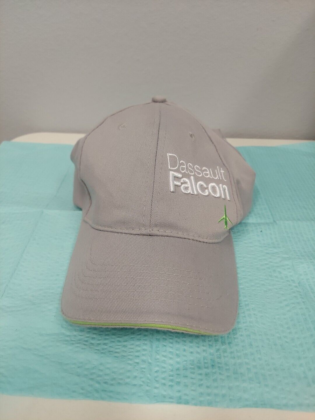 Dassault Falcon Airplane Adult Baseball Cap Gray In Color With Green Strap