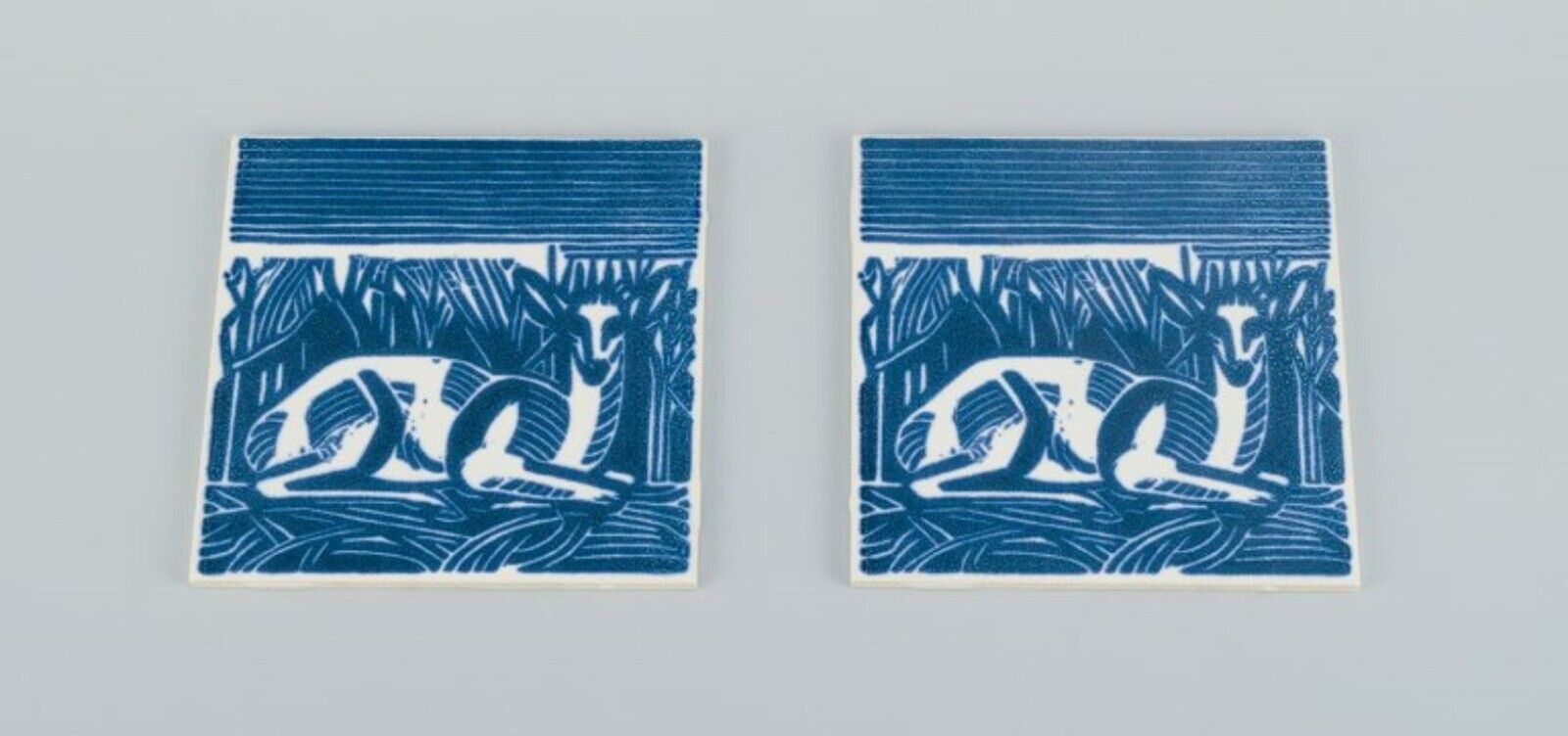 Axel Salto for Royal Copenhagen, two rare tiles. Motif of reclining deer.