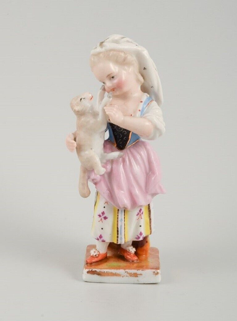 Porcelain figurine, Meissen similar stamp. Girl with a lamb, late 19th C.