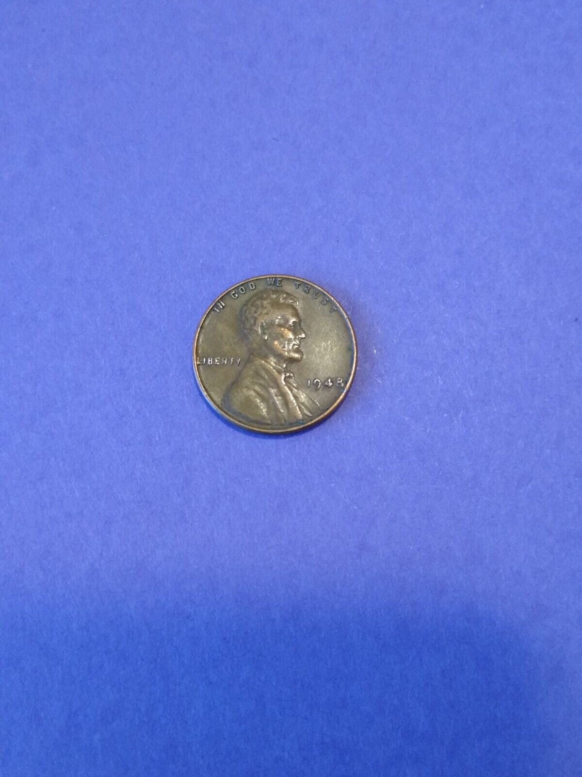 1948 Lincoln penny. no mint mark. L in rim. RV toning error. Rare. 4805