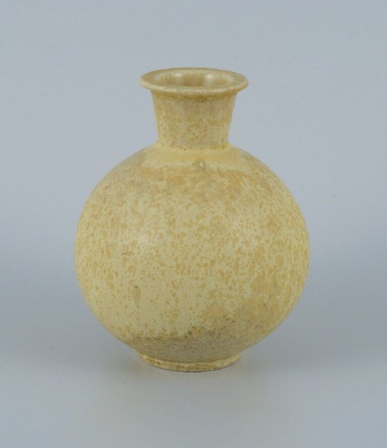 Berndt Friberg for Gustavsberg. Ceramic vase with speckled yellow glaze. 1960s.