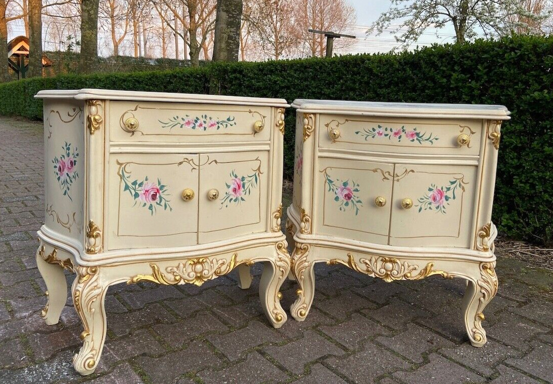 A pair of antique Italian Baroque/Rococo nightstands in cream or ivory beech