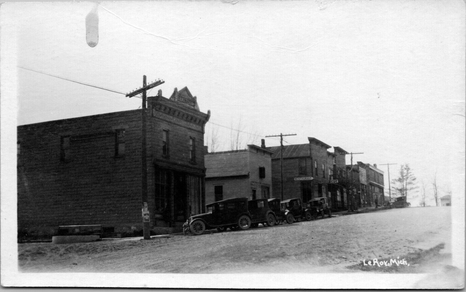 Leroy Michigan RPPC Street scene Bixby Cafe Old Cars early 1900s