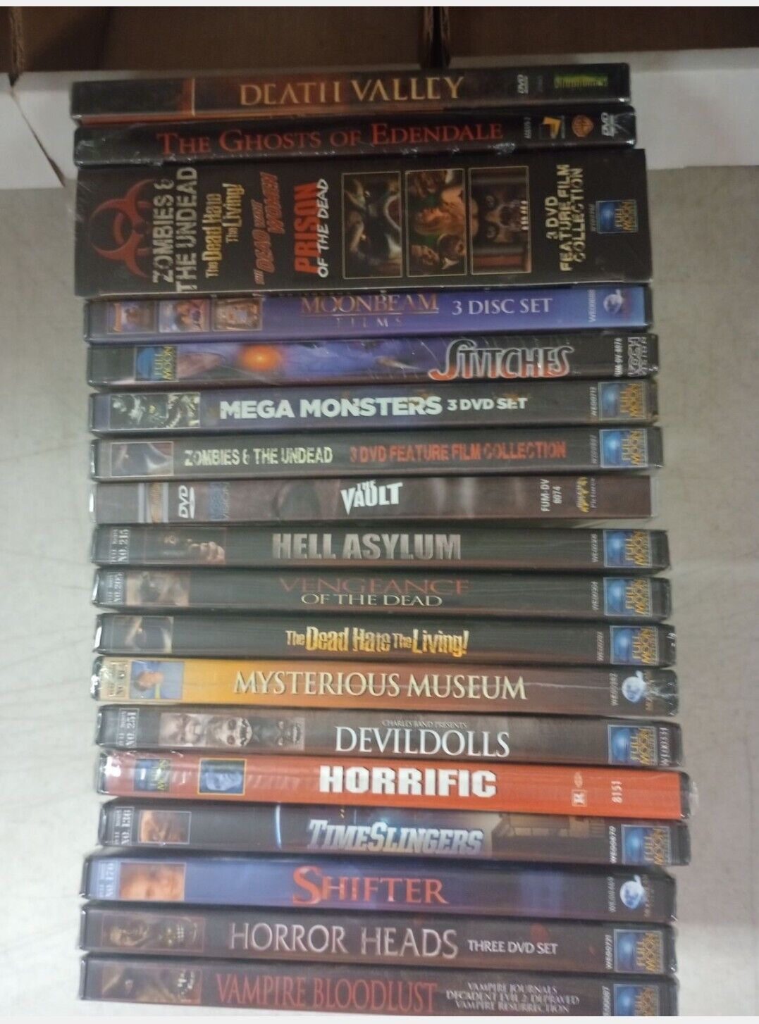 20 RANDOM FULL MOON HORROR DVD MOVIES WITH PIMP DOLL AND MARVIN FIGURES INCLUDED