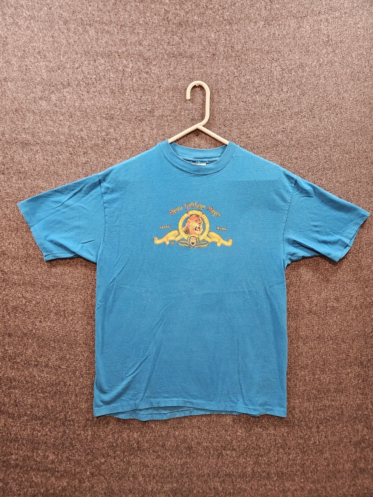 Vintage MGM Metro Goldwyn Mayer T-shirt Single-Stitch 1980s Blue Used Condition 