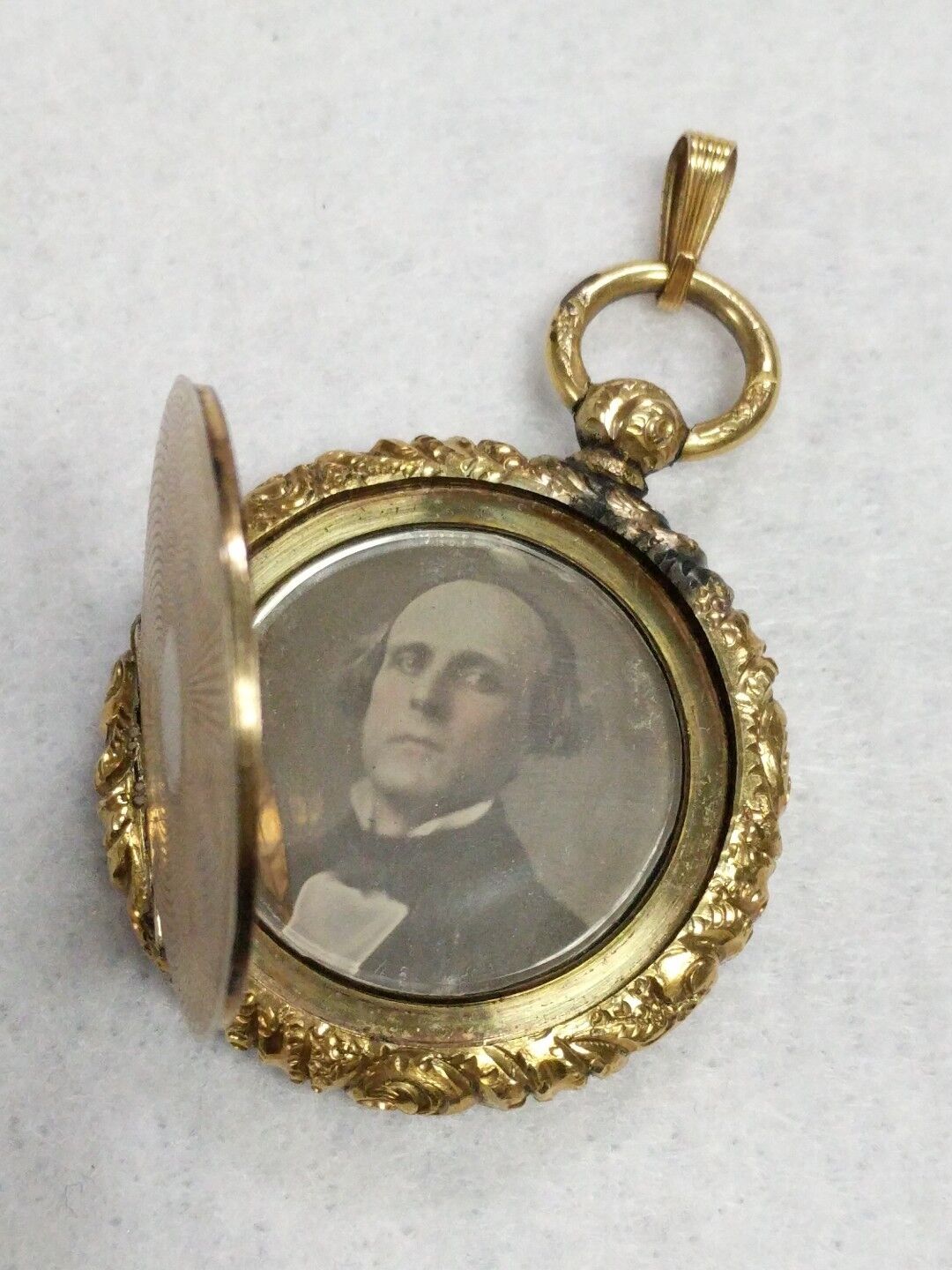 Exquisite Antique Gold Filled Double Locket with Colored Daguerreotype Photos