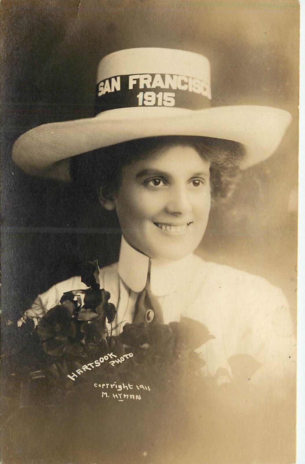 RPPC Postcard PPIE Panama Pacific Expo Hartsook Photo Woman in 1915 Hat M Hyman