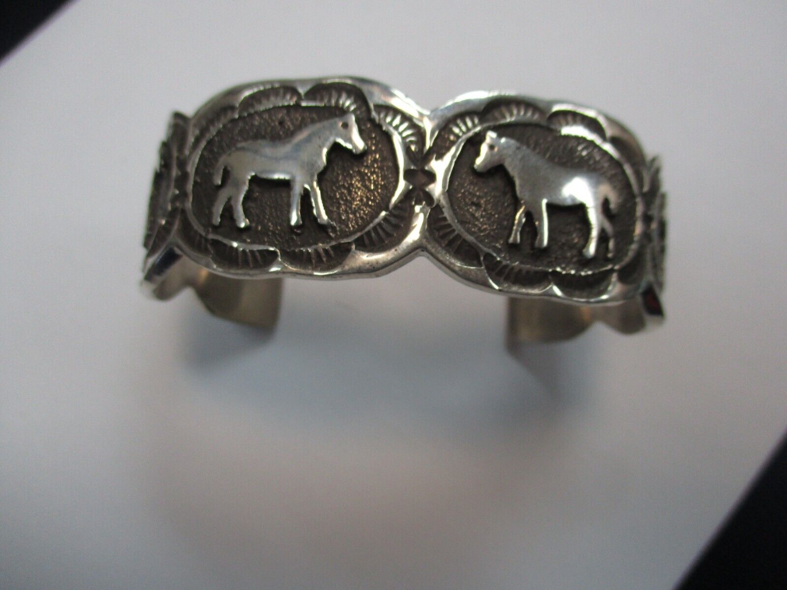 Native American Sterling Silver cuff Bracelet with Horses  design signed