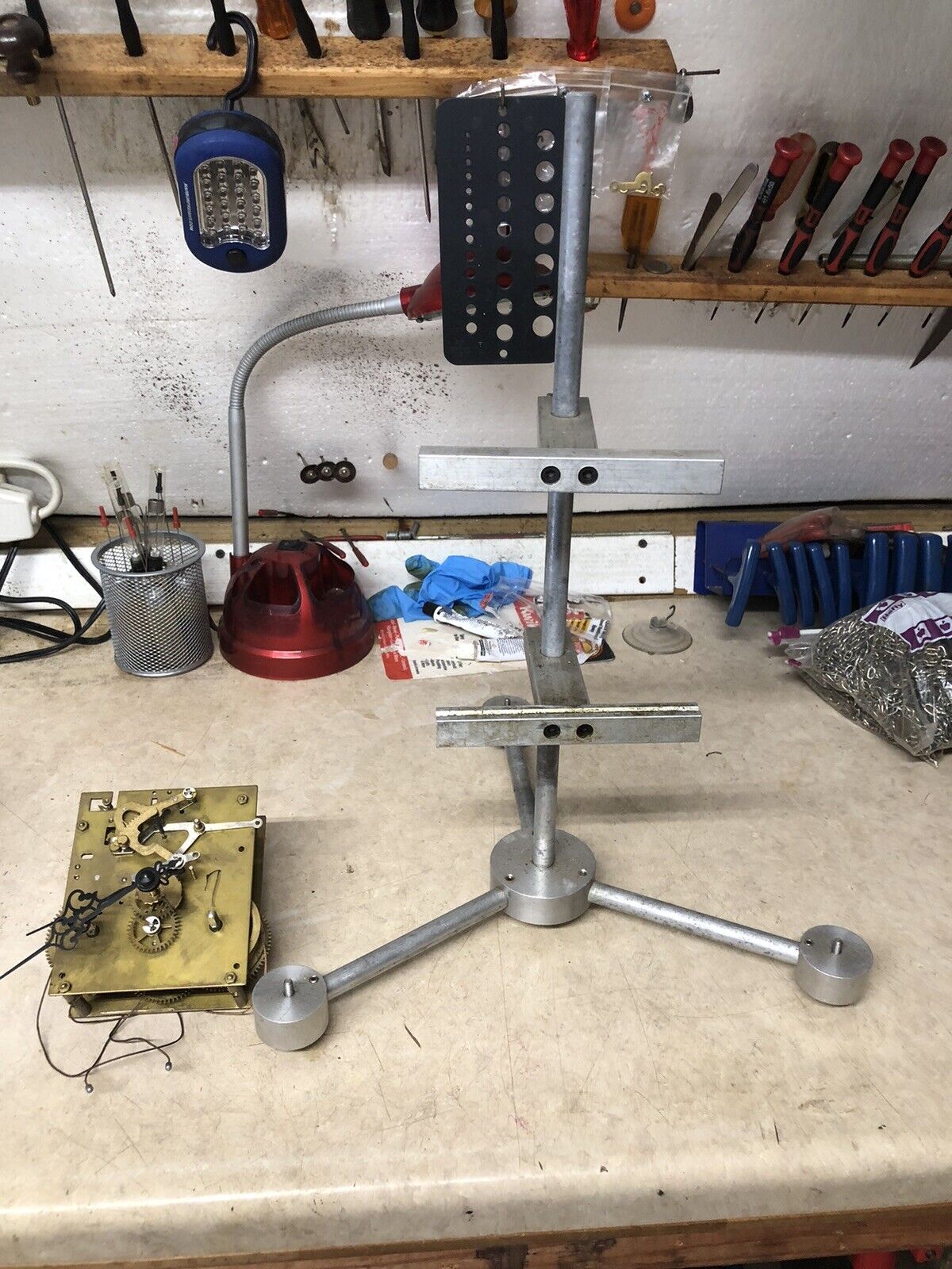 Clock movement repair stand Made Of Aluminum. Works Great With Mechanism