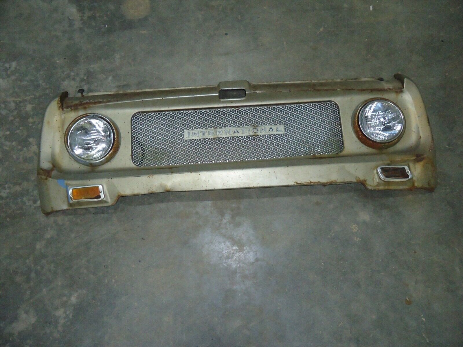 1967 INTERNATIONAL SCOUT 800 FRONT HEADER PANEL WITH GRILLE AND HEADLIGHTS