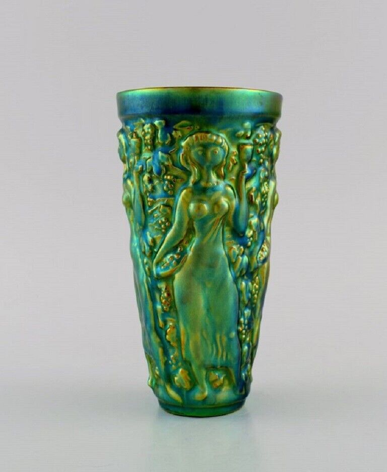 Zsolnay vase in glazed ceramics with women picking grapes. Mid-20th C.