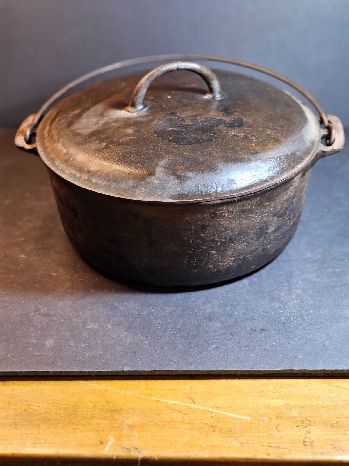 Griswold No. 6 covered pot.cast iron wire handle marked on bottom of pot/and lid