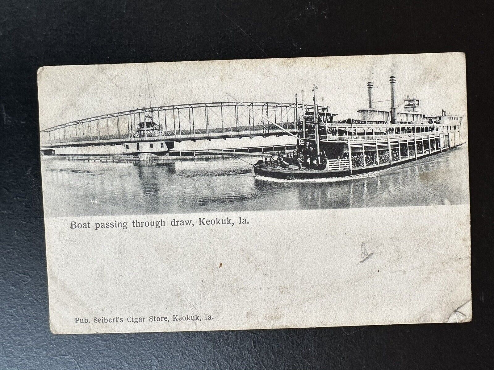 Vintage Postcard Boat Passing Through draw Keokuk Iowa Pub. Seibert Cigar Store