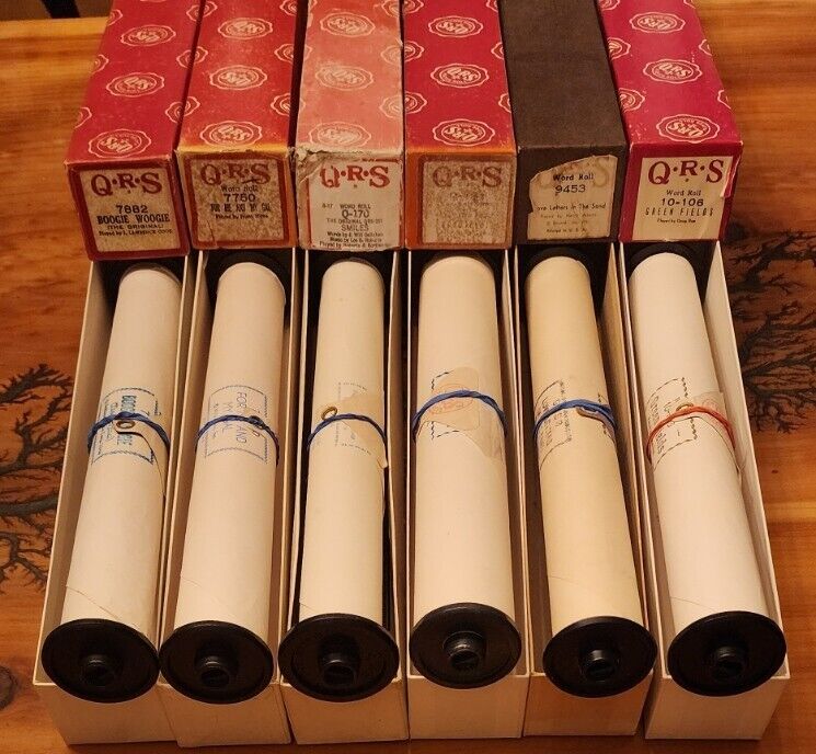 Six QRS Player Piano Word Rolls