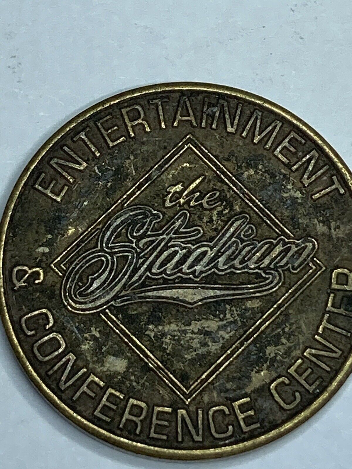 VINTAGE THE STADIUM ENTERTAINMENT & CONFERENCE CENTER ADVERTISING TOKEN - LOOK