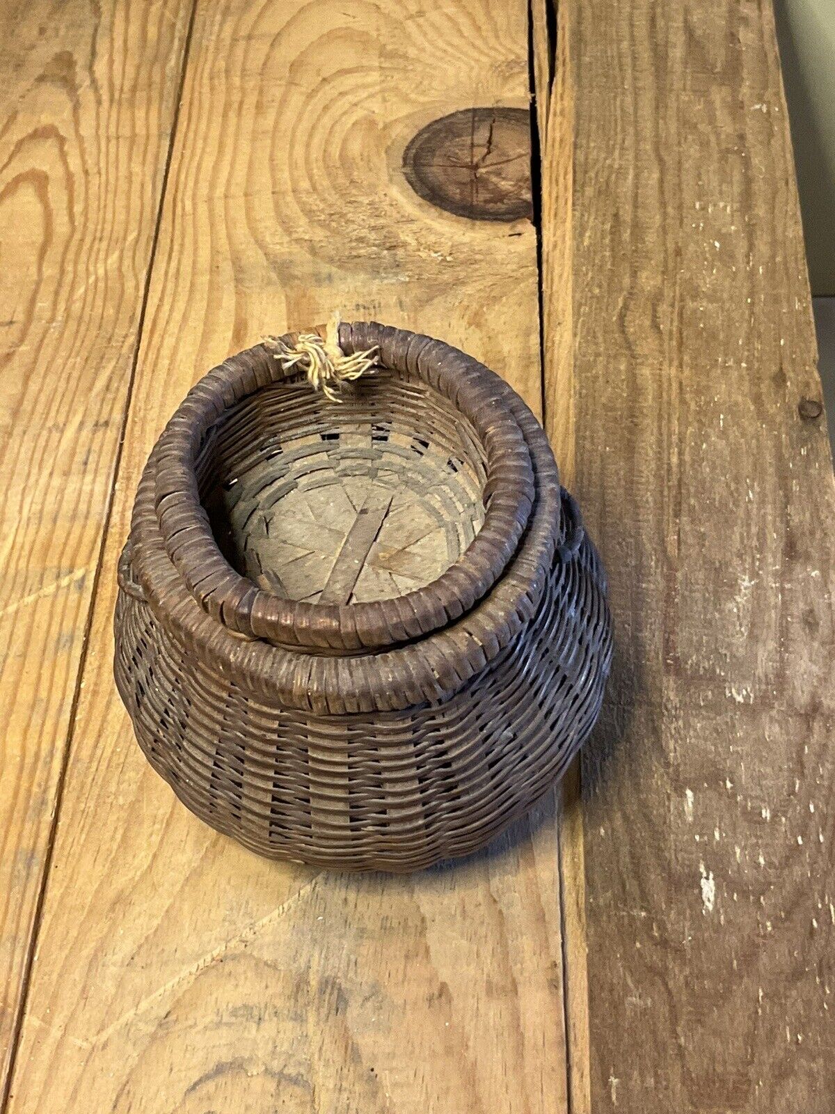 A RARE tiny antique woven splint miniature basket. American origin circa 1900